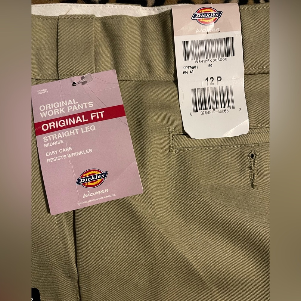 Size 12P khaki dickies. The stiff kind. Fit like a 14P.